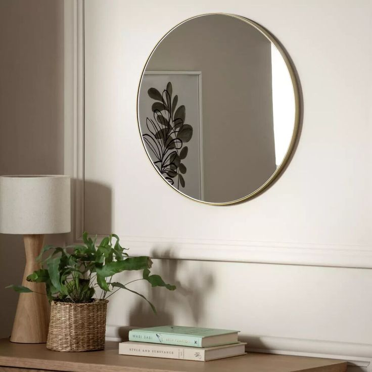Frameless Round Mirror in a Bathroom