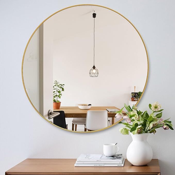 Frameless Round Mirror in a Bathroom